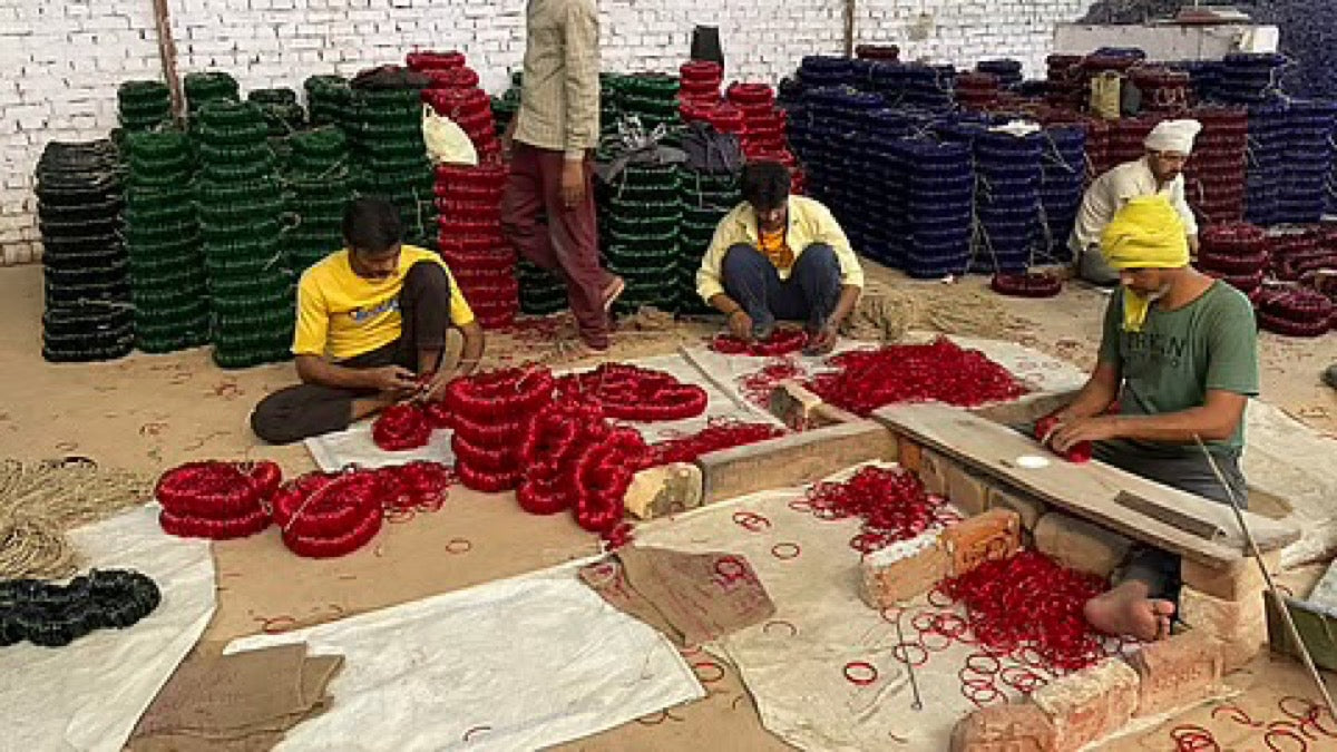 Workers sorting and bundling finished bangles in the Firozabad workshop
